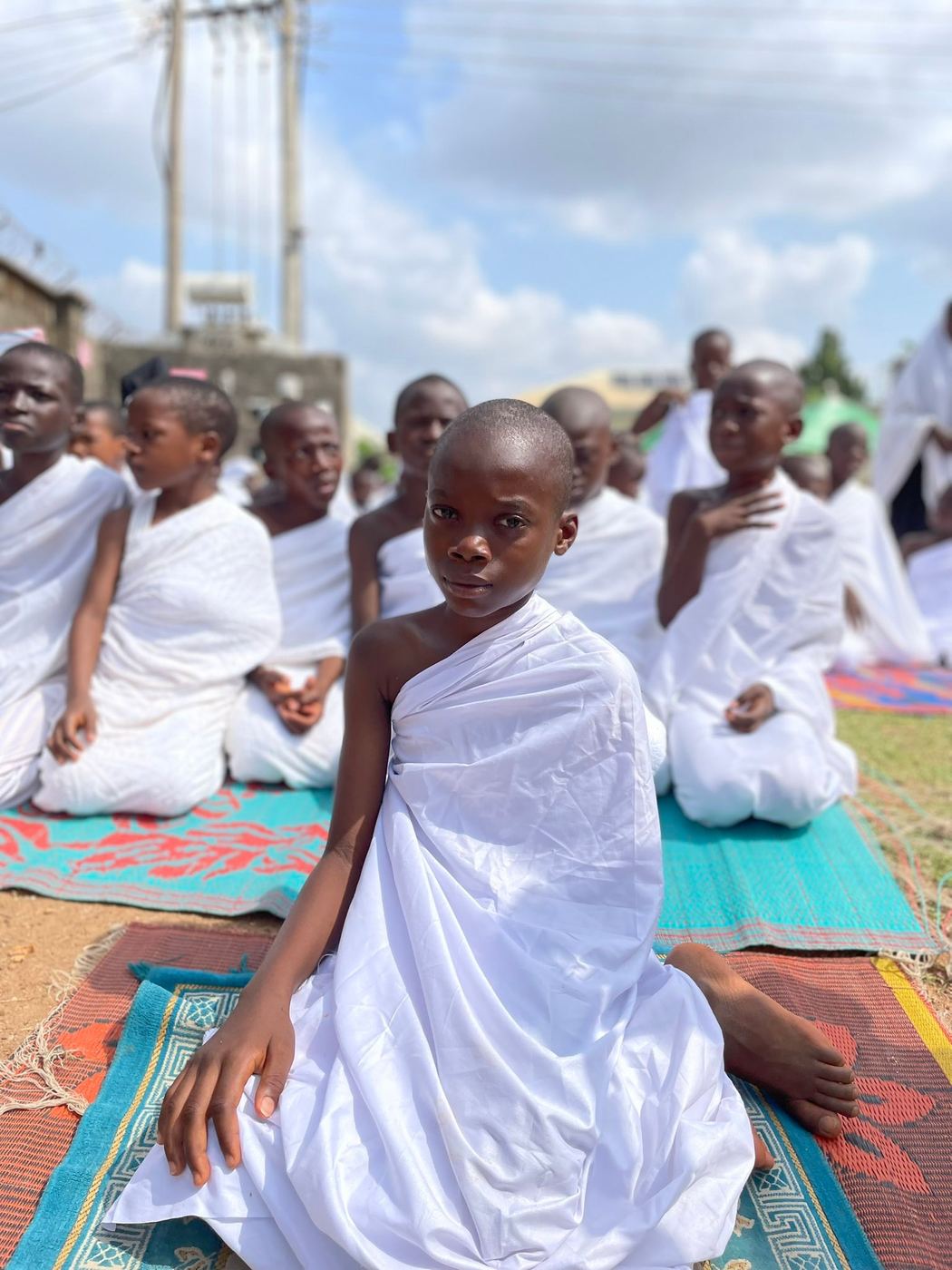 Learners seated together during a Hajj-themed school presentation