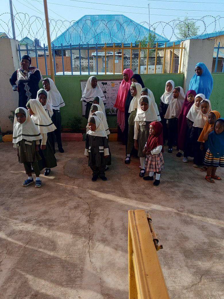 Students gathered in the courtyard for a guided school activity
